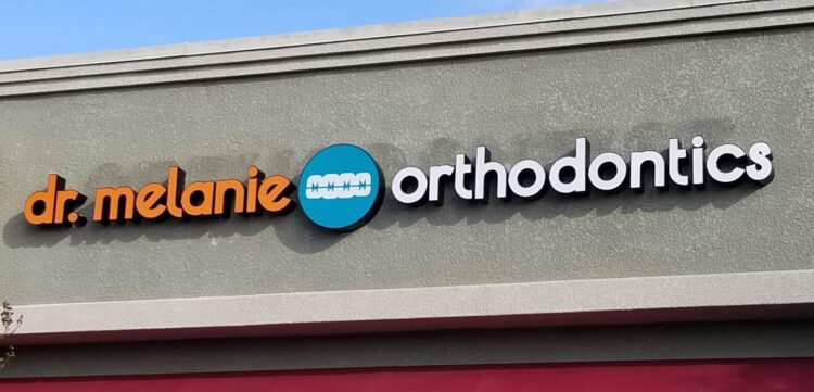 Dr Melanie Orthodontics sign